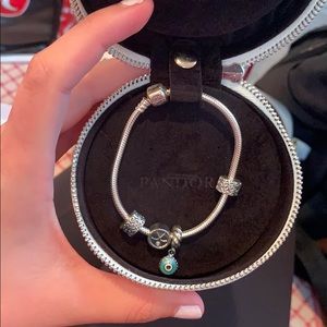 Brand new Pandora bracelet with two charms!!!